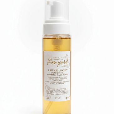 Luxurious Donkey Milk Foaming Face Wash in a clear pump bottle.