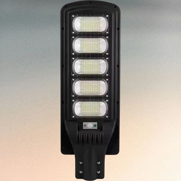 A modern black LED streetlight with five rectangular light panels.
