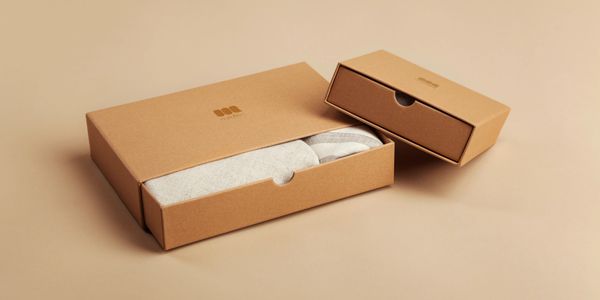 A custom branded box with clothes in it.