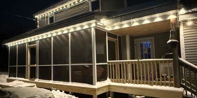 Beautiful screened-in porch entry with lights
