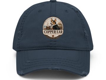 Navy blue cap with Copper Ear logo.