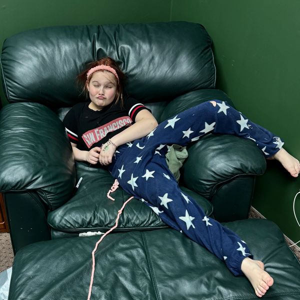 hazel in her comfy crocheting chair