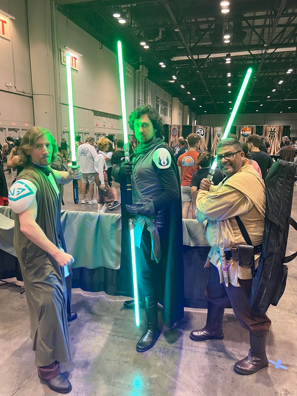 Biker Jedi in Jedi cosplay with fellow cosplayers