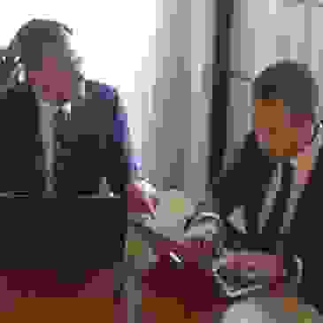 Simon Bailey and Casey Cahill working on a communications strategy in Perth