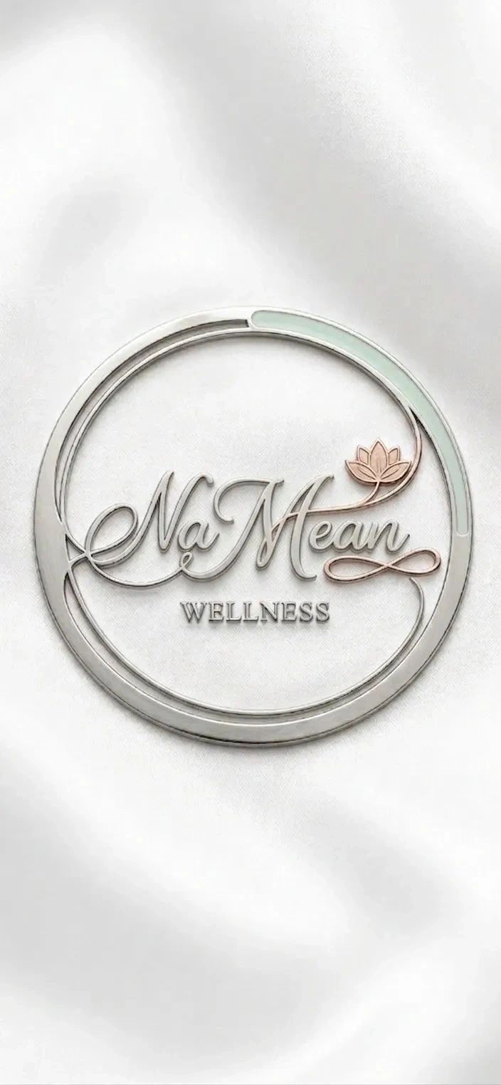 Elegant Na Mean Wellness logo with a lotus design.