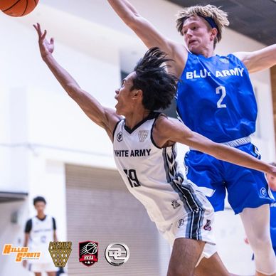 Two basketball players from White Army and Blue Army compete intensely.