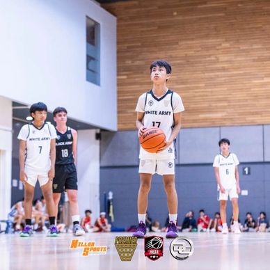 Young basketball player preparing to shoot a free throw during a game.