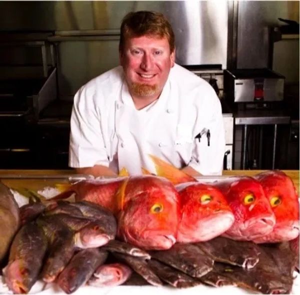 Personal Chef David Cunningham with fresh fish preparing to cook for an event