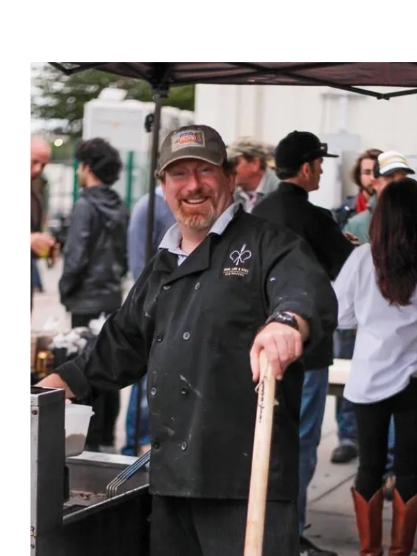 Personal Chef David Cunningham on 30A showcasing his famous gumbo at an event