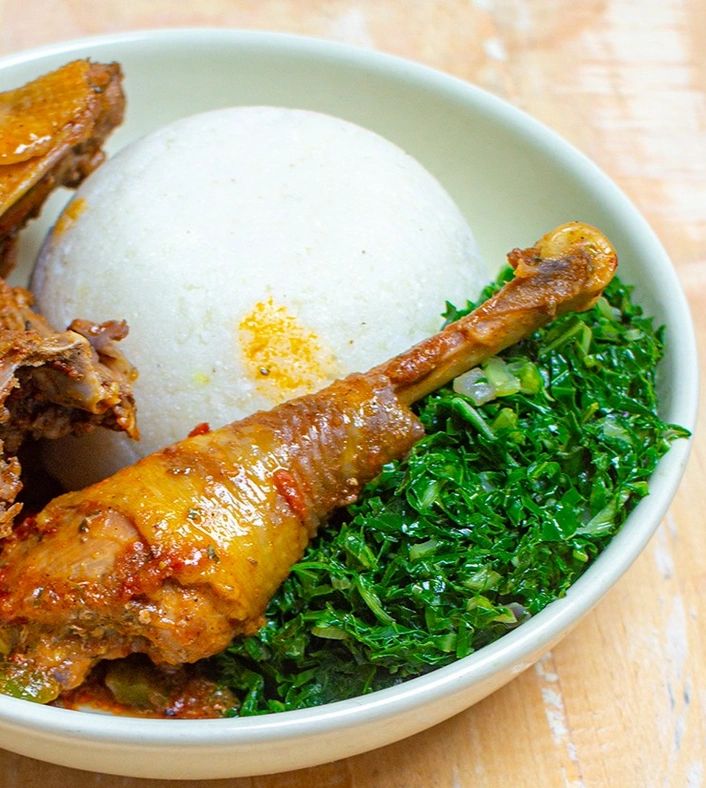 Sukuma Wiki Served with Chicken and Ugali [Img:Instagram@infoods_special]