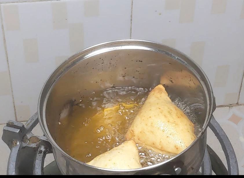 Deep Frying Mandazi