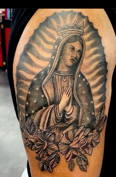 traditional style religious tattoo