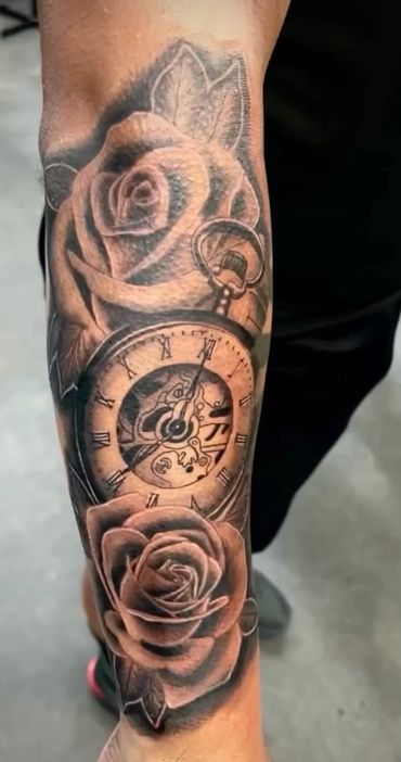 realistic tattoo of roses and pocket watch