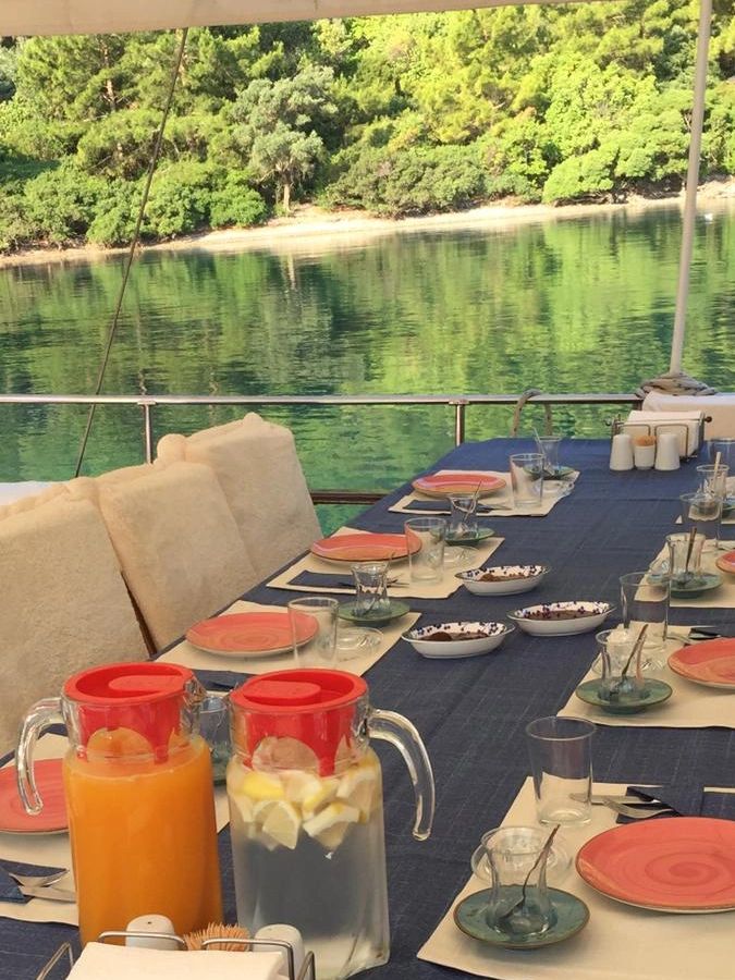 Enjoy breakfasts in calm bays after your morning yoga on this yoga sailing retreat .