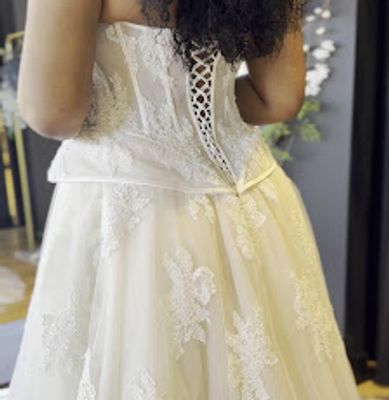 Back view of a lace-up wedding dress.
