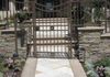 Stone entry with iron gates