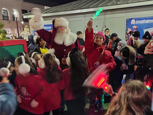 Santa Lighting the tree at Atlas Mall Glendale NY.  Hire Santa Claus Glendale NY