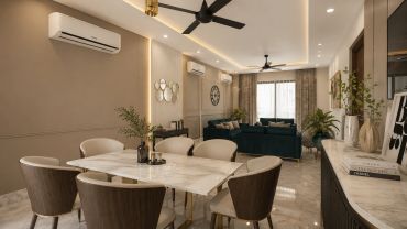 Modern dining and living room with elegant decor.
