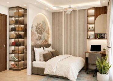 Elegant modern bedroom with shoe display and workspace.