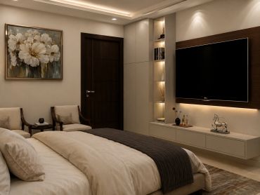 Contemporary bedroom interior in Gurgaon featuring a custom TV unit, warm lighting and elegant neutral finishes.