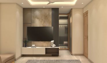 Modern living room with TV and elegant decor.