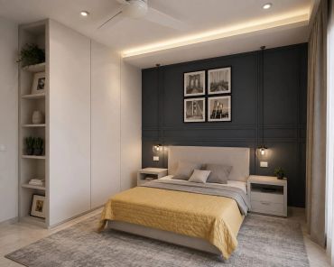 Modern bedroom with yellow bedspread and black accent wall.