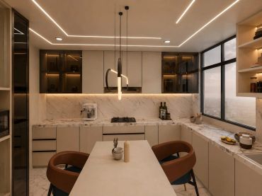 Modern kitchen with marble countertops and warm lighting.