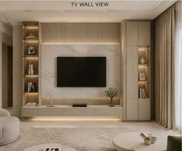 Modern living room with mounted TV and illuminated shelves.