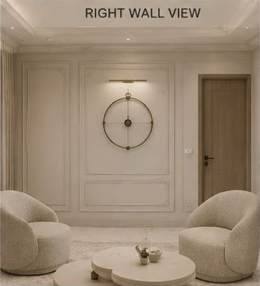 Minimalist living room with round chairs and wall clock.