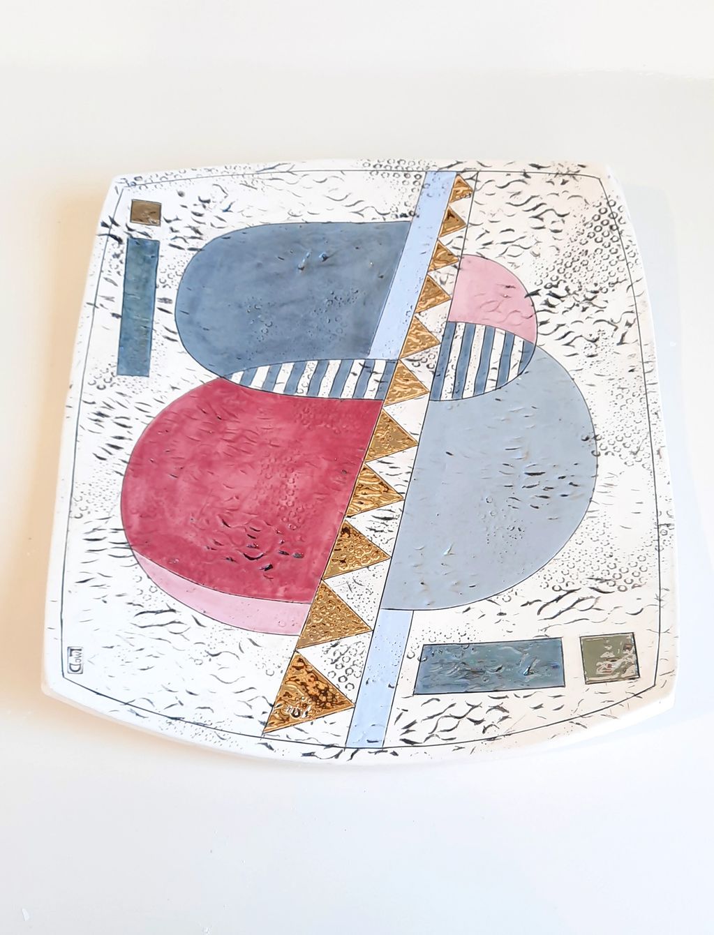 'A NOD TO MODERNISM'  Porcelaneous earthenware. Incised design. underglaze colour, 22ct gold lustre.