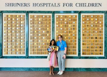 Skyler Farasat of Skye+Fam with Leadership at Shriner's Hospital for Children NorCal