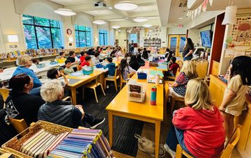 4th graders engrossed in Skye+Fam storytime!