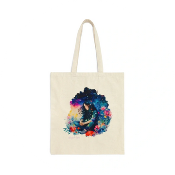 Canvas tote bag with art of a girl meditating in a meadow from Skye+Fam book Me and the Universe