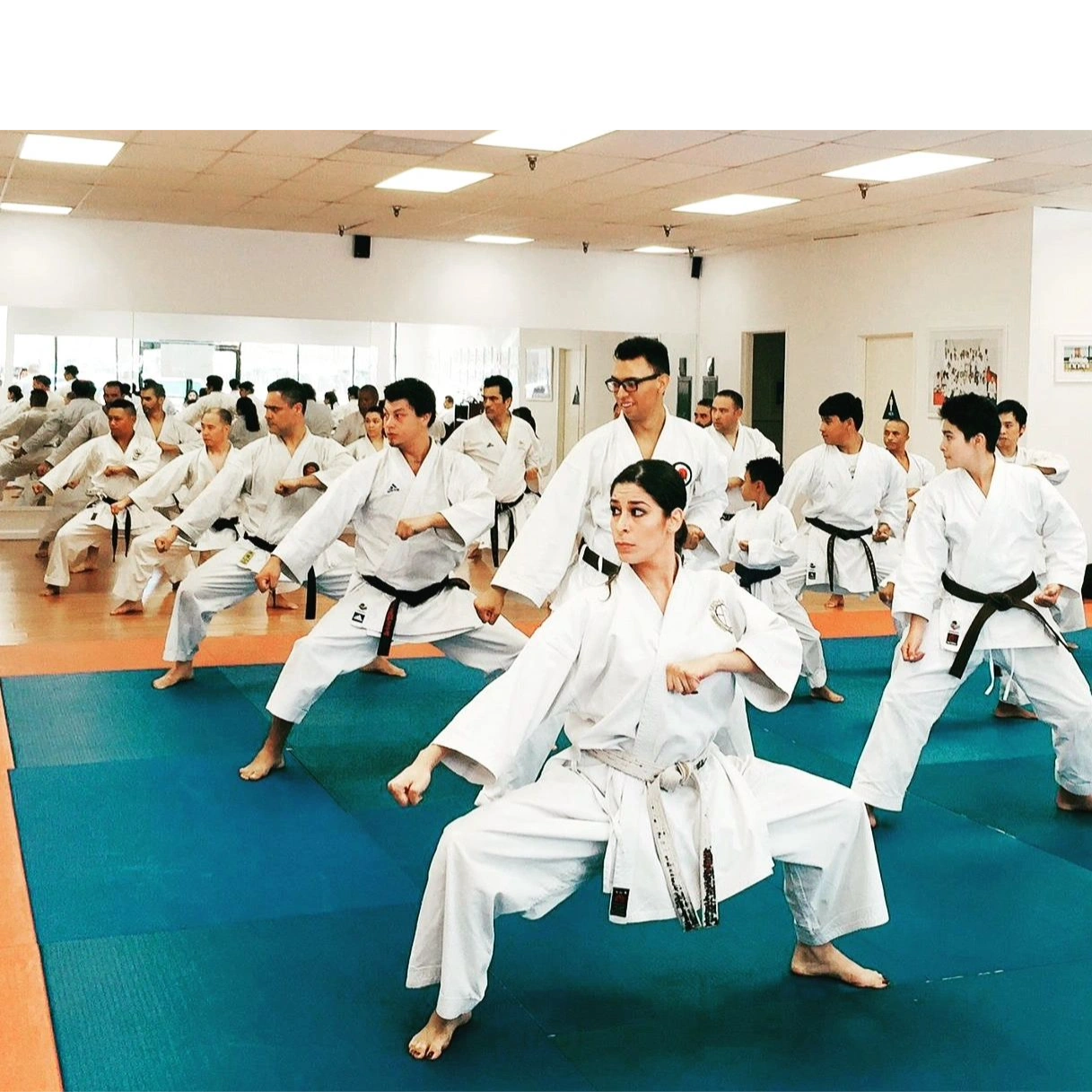 Sensai Tamara Canedo, CEO of Seiden-Juku training with black belt karate-do class.
