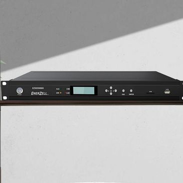 Enerzell EZMS9000 audio equipment with display and control buttons.