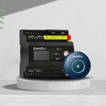 Enerzell energy management device with a blue control button on a pedestal.