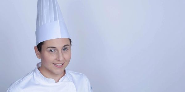 Chef Lindsay Valley in chef whites and toque