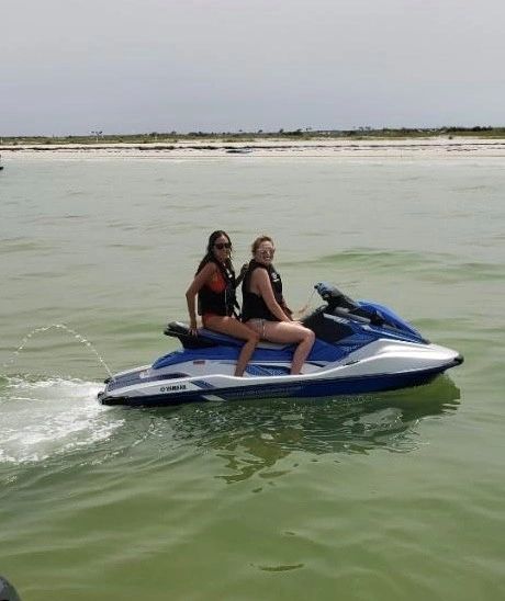 Friends on jet skis