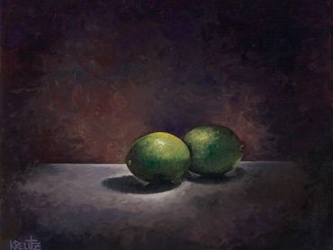 Painting of two green limes on a surface.