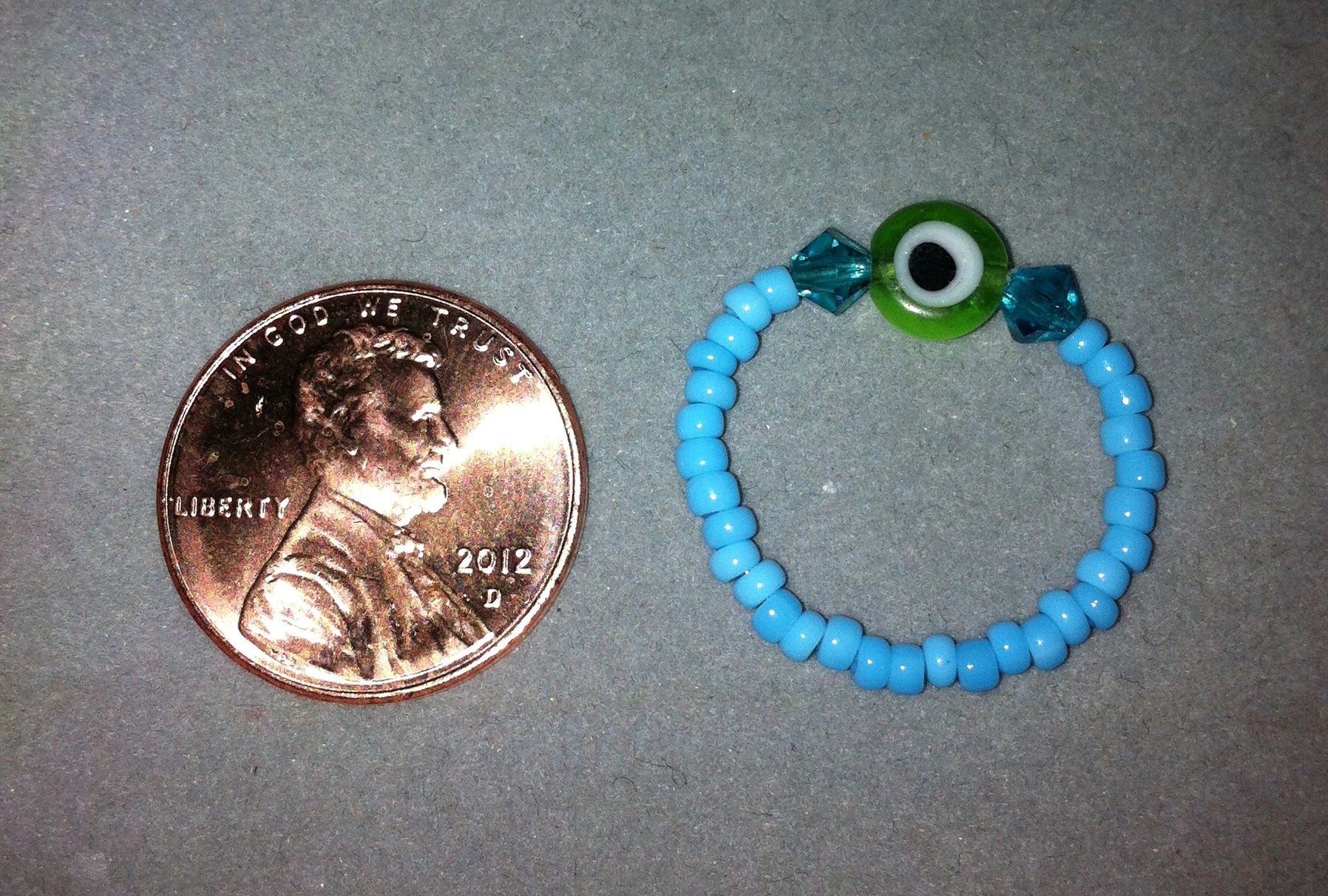 Seed Bead Ring with Flat Evil Eye and Swarovski Crystals 