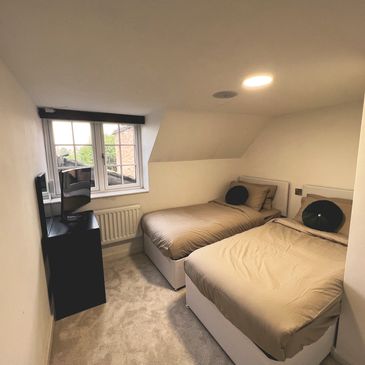 Twin room view of whole room. 