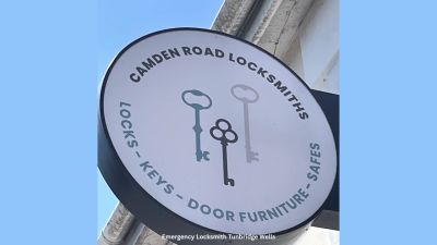 Sign for Camden Road Locksmiths with vintage keys.