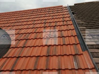 Roof with red and brown tiles.