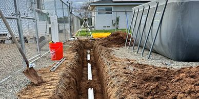 Precision excavation in a tight spot located in Reedley California in Fresno County.