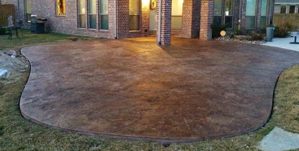 Xellent concrete: stained and stamped concrete patio