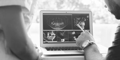 examination for oral surgery x-ray consultation with gentle surgeon 