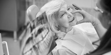 patient and dentist oral surgery oral surgeon gentle compassionate evaluation and consulation