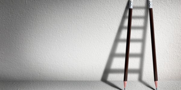 Stairs with pencil for effort and challenge in business to be achievement and successful concept.
