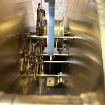 An artist shot of the mechanical insides of a lantern clock