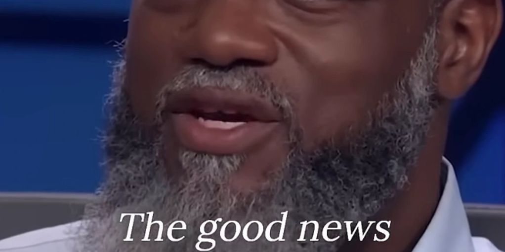 Man with gray beard saying 'The good news'